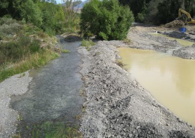 Photograph of diverted water joining braid.